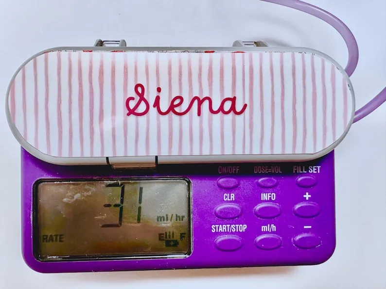 Candy Stripe Name sticker on a feeding tube pump
