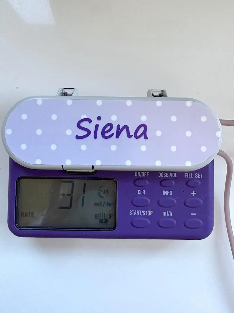 Polka Dot Name sticker on a feeding tube pump